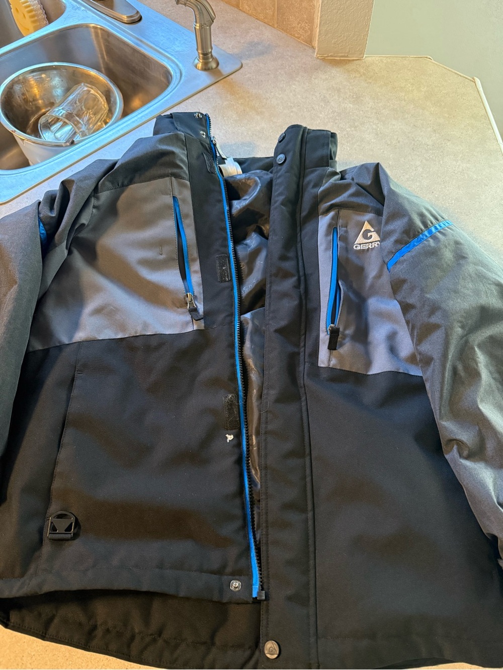 Gerry Weber Men's Black and Gray Ski Jacket with Blue Accents